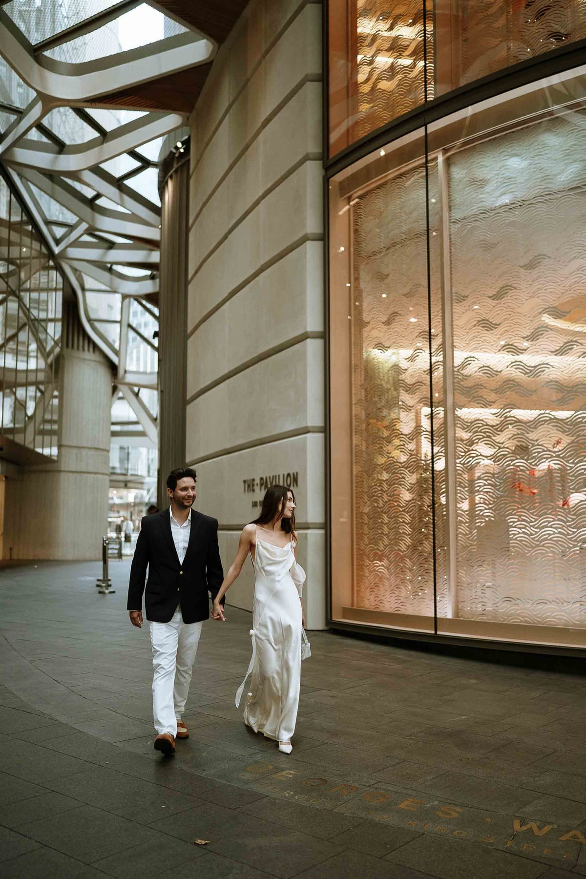 Christmas Date night couple photoshoot at St Marys cathedral, Morena bar and Martin place
