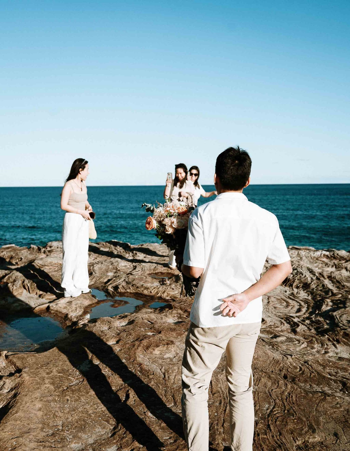 Jackie’s Surprise Proposal at Coogee Beach Cliffs | Sydney Coastal Engagement Photography