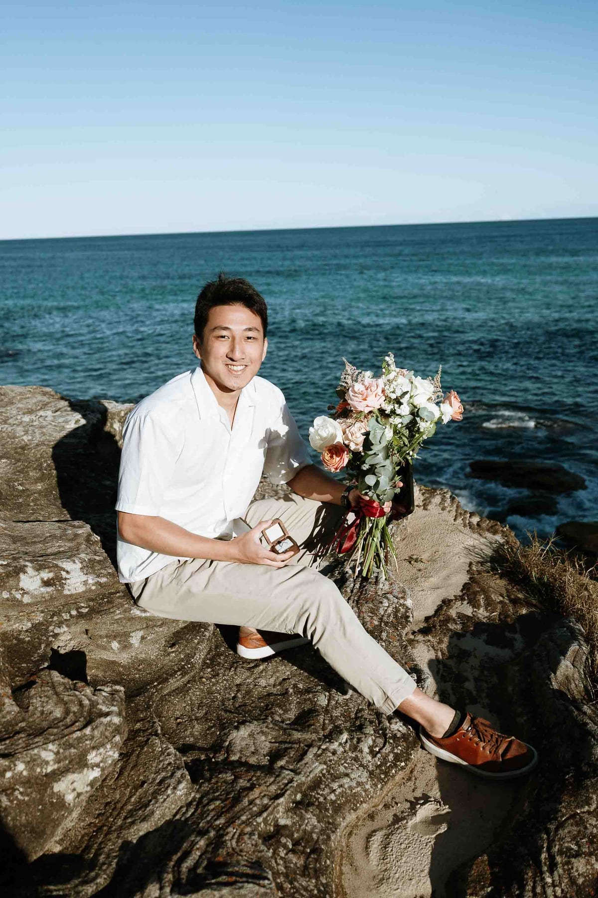Jackie’s Surprise Proposal at Coogee Beach Cliffs | Sydney Coastal Engagement Photography