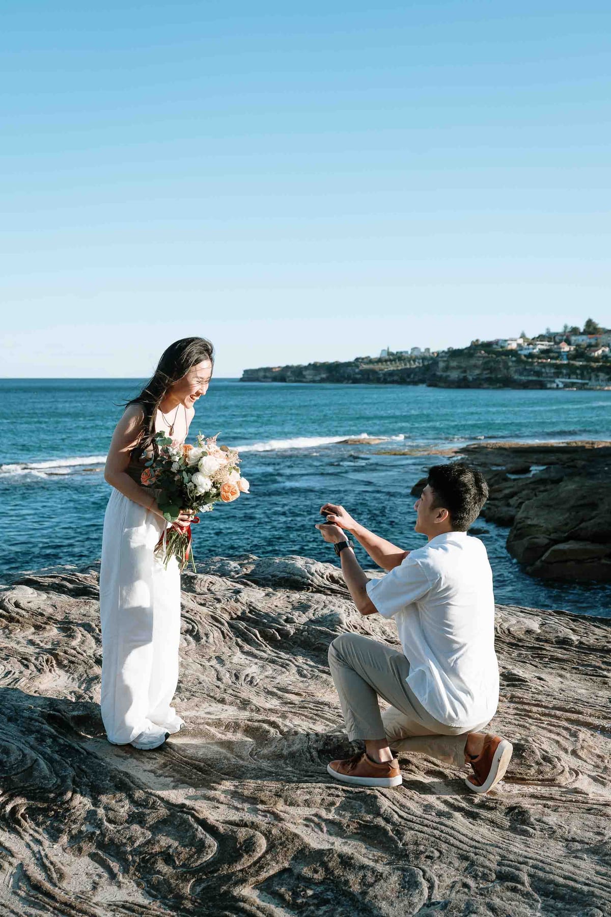 Jackie’s Surprise Proposal at Coogee Beach Cliffs | Sydney Coastal Engagement Photography