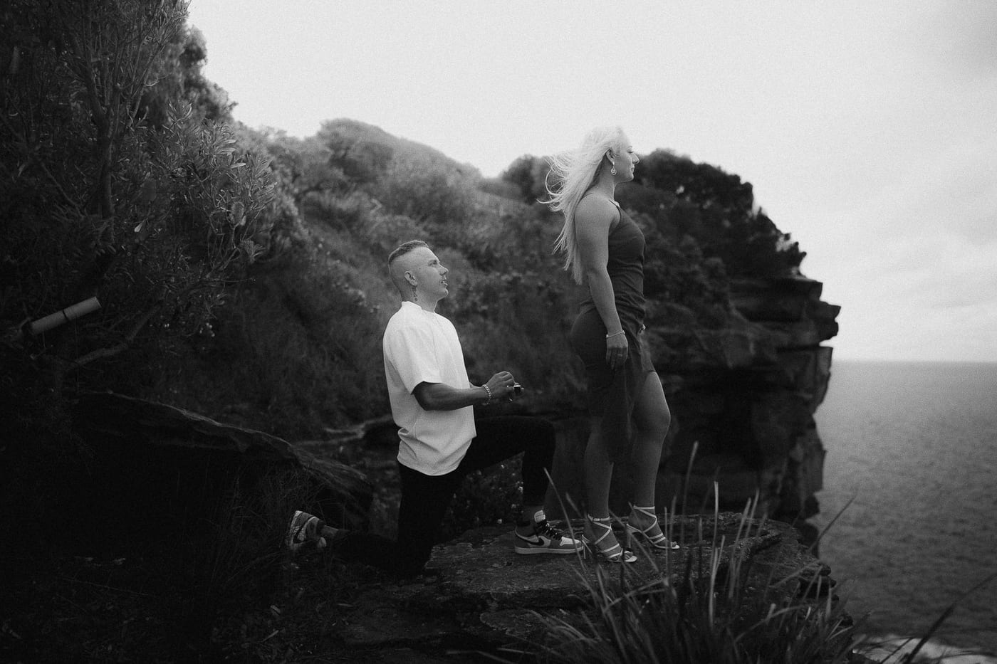 Lachlan and Kirra’s Surprise Proposal at Diamond Bay Cliffs | Sydney Coastal Engagement Photography