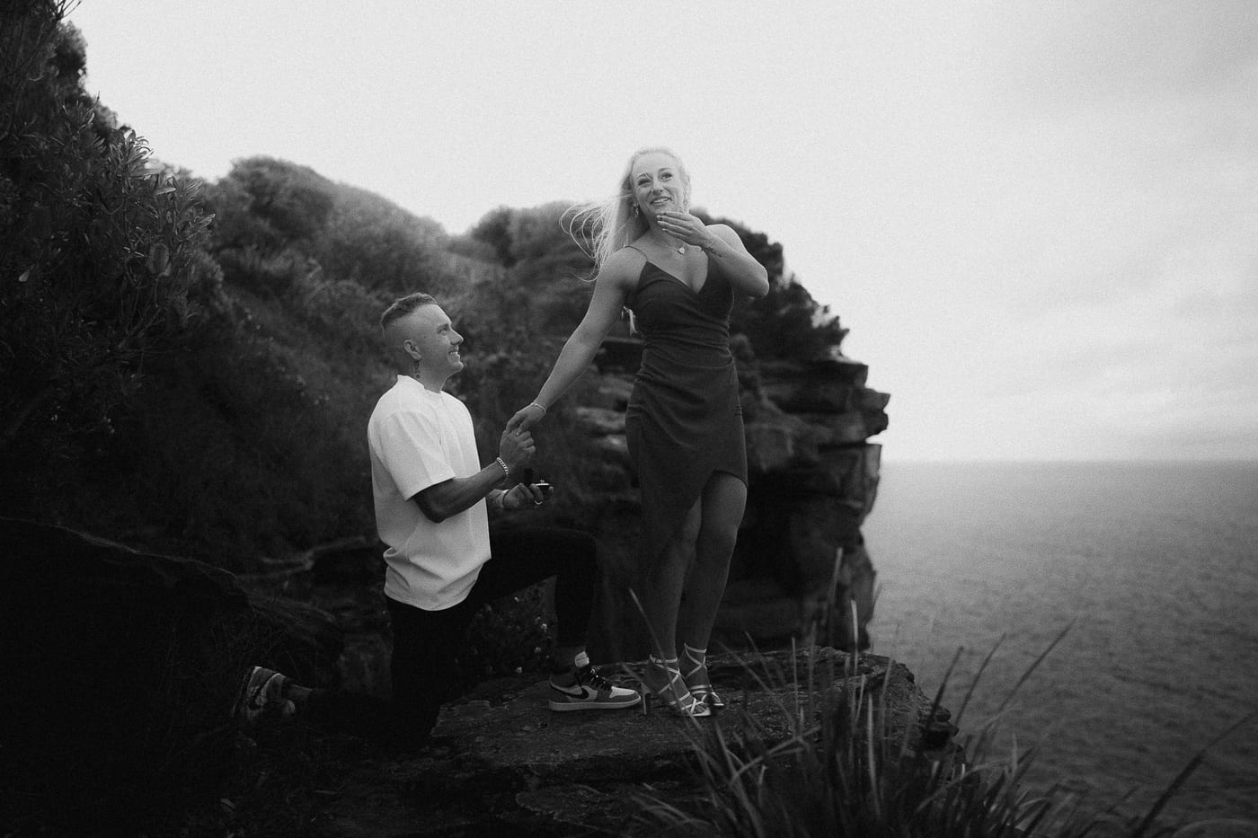 Lachlan and Kirra’s Surprise Proposal at Diamond Bay Cliffs | Sydney Coastal Engagement Photography