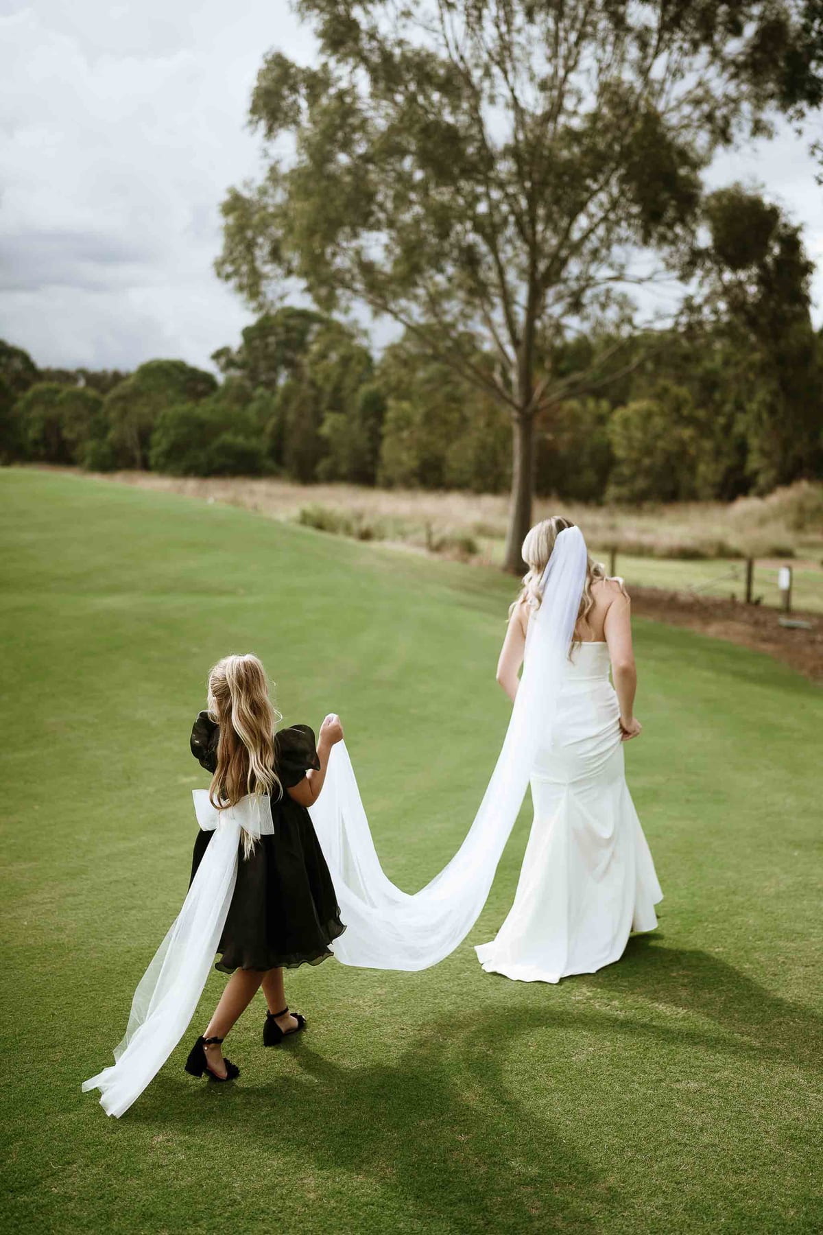 Dylan and Tayoni's Romantic Garden Style Wedding with Cinematic Golf Course Views