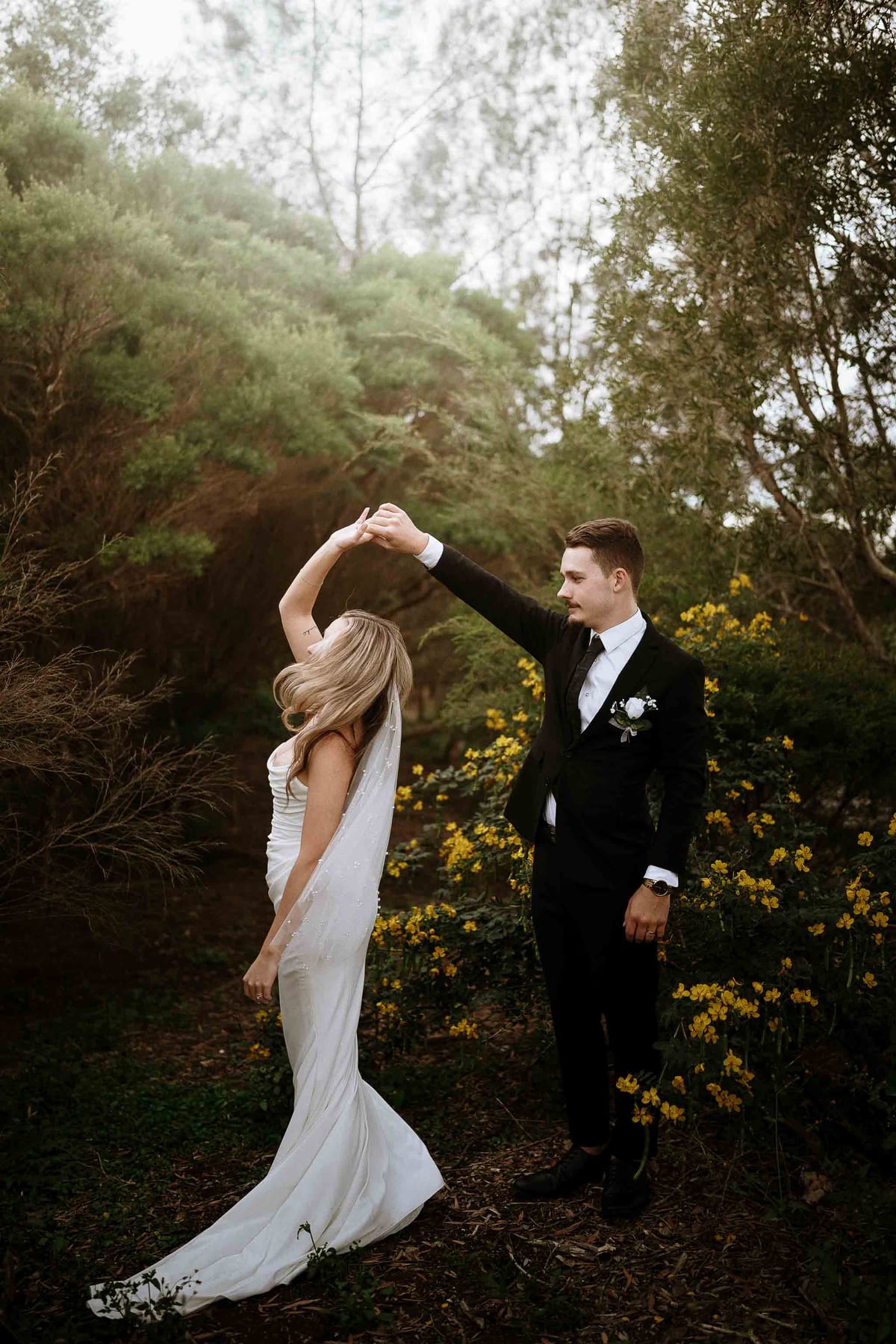 Dylan and Tayoni's Romantic Garden Style Wedding with Cinematic Golf Course Views